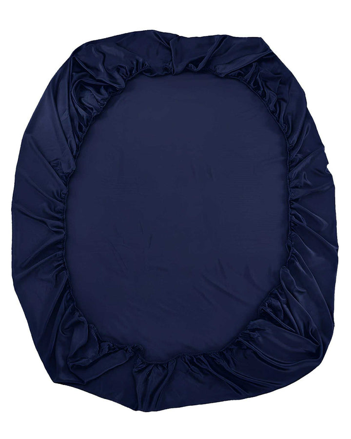 A dark blue, oval-shaped 19 Momme Seamless Silk Fitted Sheet with an elastic edge by SusanSilk.
