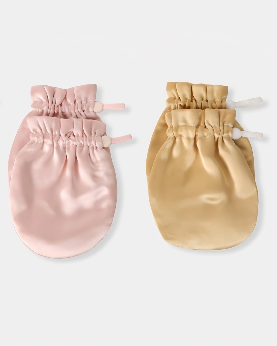Multiple color options of 19 momme baby silk gloves displayed together, offering stylish and gentle protection against baby face scratching.