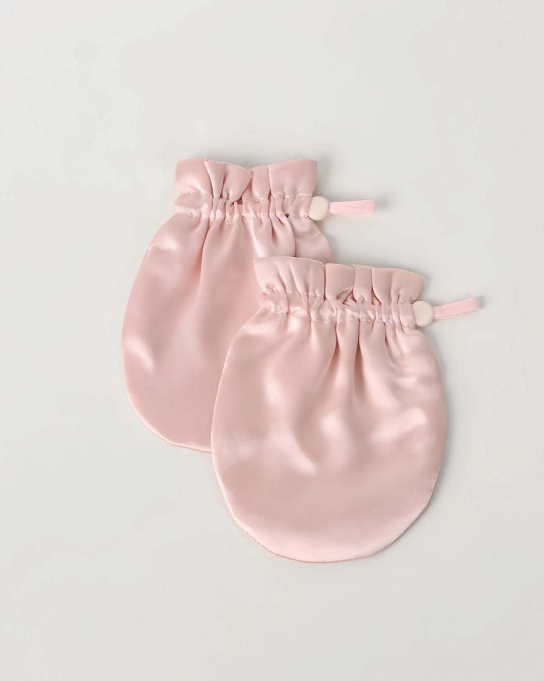 19 momme baby silk gloves designed as an essential newborn gift, combining anti-face grabbing protection with luxurious mulberry silk.