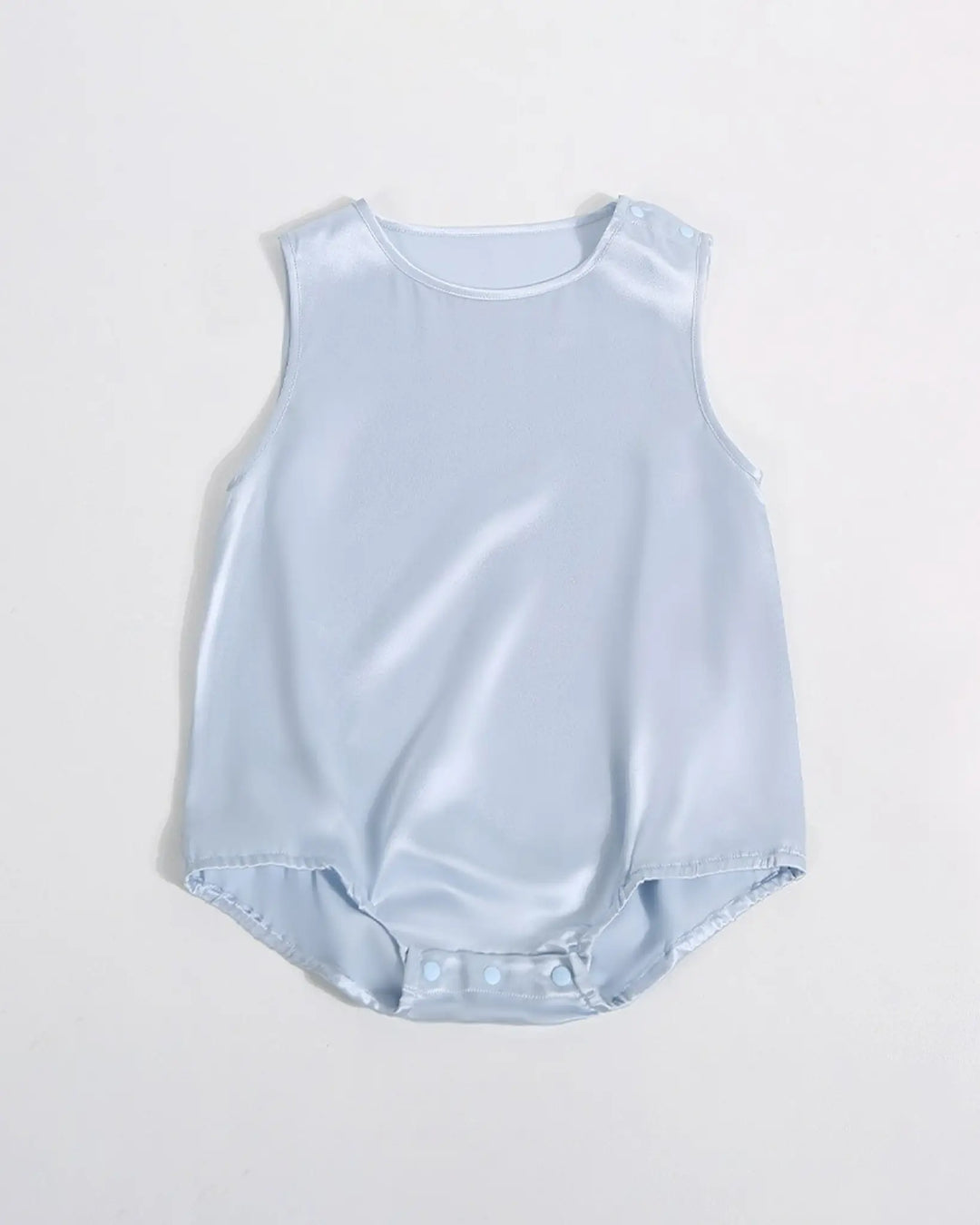 Light blue sleeveless top on a light gray background