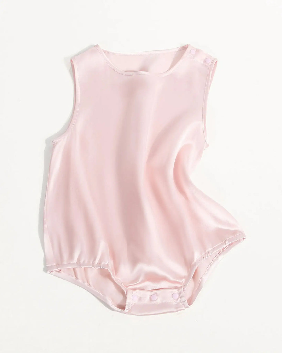 Collage of close-up views of a pink 19 Momme Silk Baby Button Onesie made from luxurious SusanSilk, featuring snap closures at the shoulder and crotch 