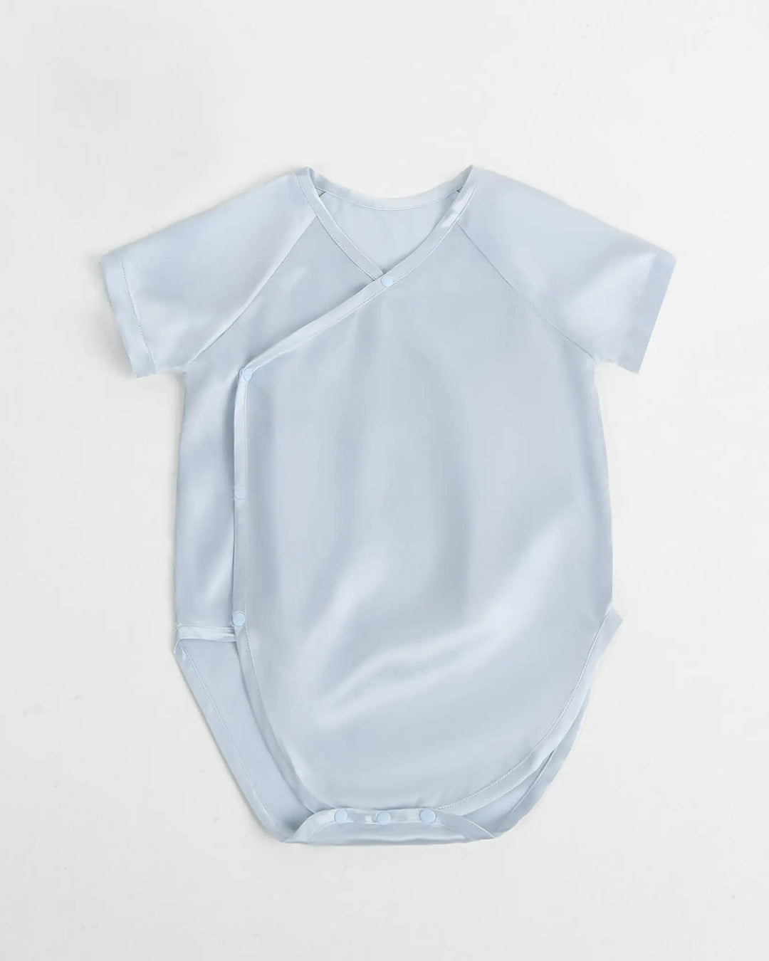 Ice blue mulberry silk baby kimono onesie with side snap buttons and lightweight breathable silk fabric