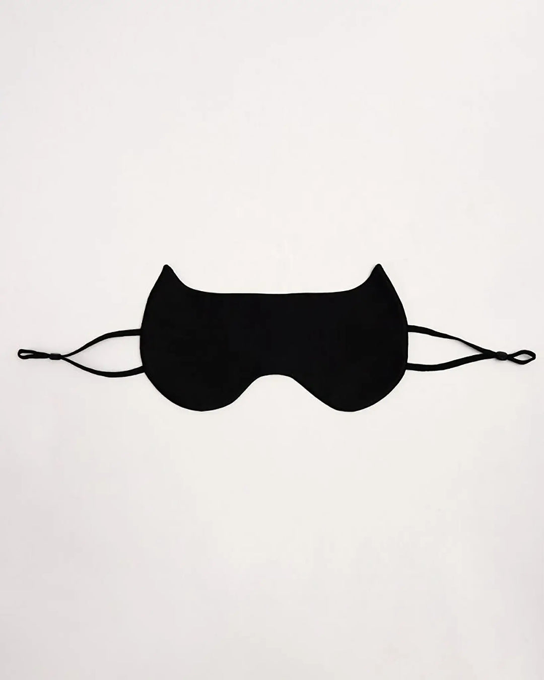 The SusanSilk Cat Shape Silk Eye Mask, featuring a luxurious black silk material with elastic straps, is displayed against a plain white background.