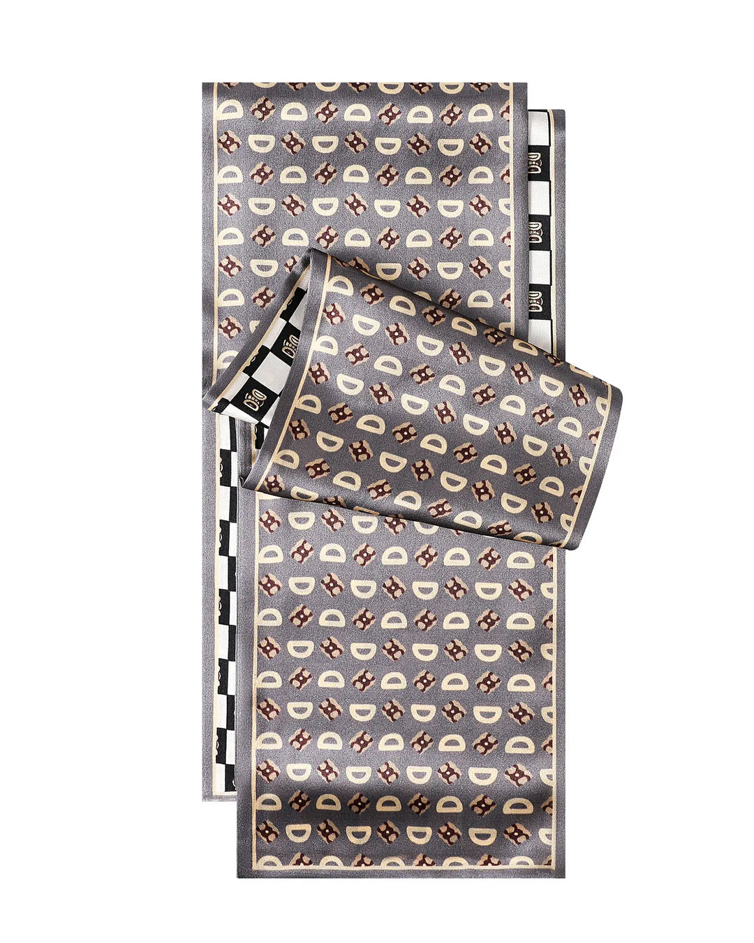 Patterned fabric swatch with geometric design on a white background