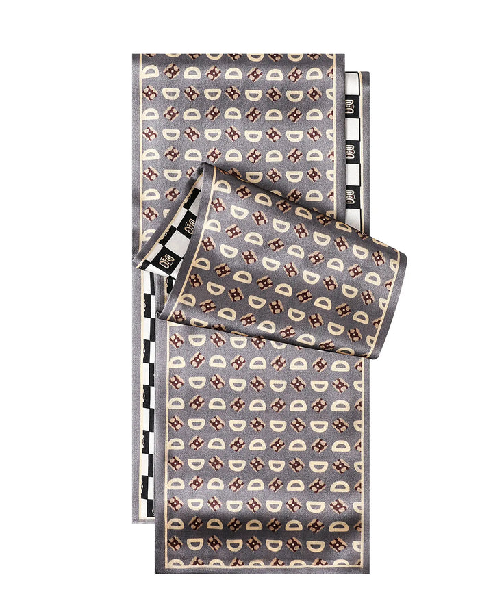 Patterned fabric swatch with geometric design on a white background