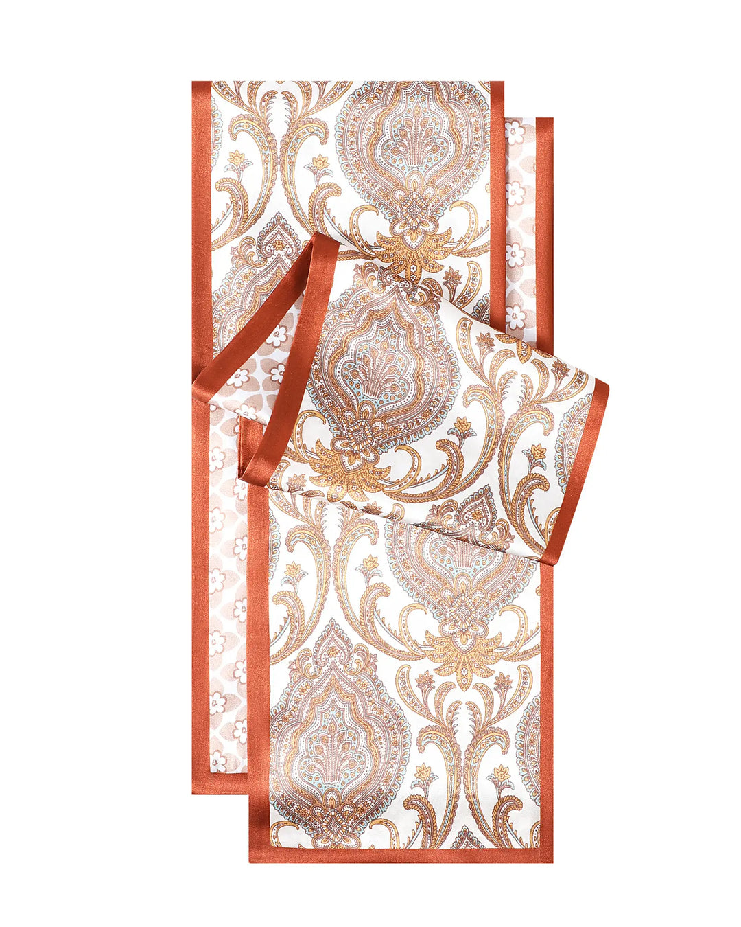 Decorative box with gold and white pattern and a red ribbon on a white background
