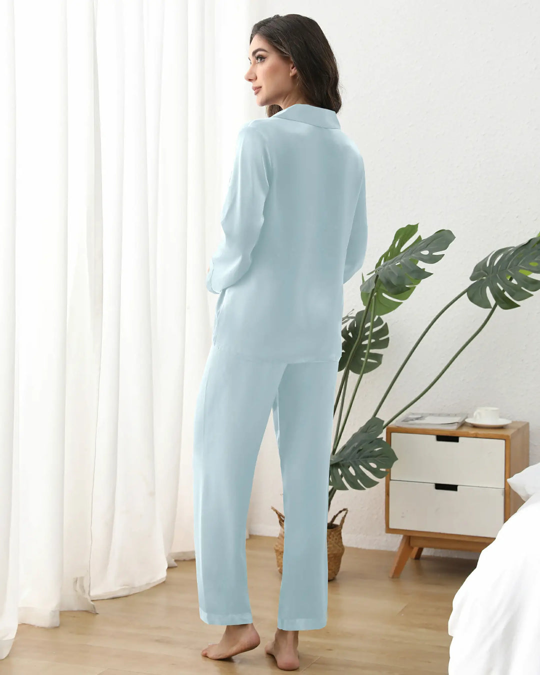 this set naturally regulates temperature, wicks moisture, and feels featherlight against sensitive skin. The V-neck collar exudes timeless charm, while tonal buttons maintain a sleek, snag-free silhouette.#color_light-blue