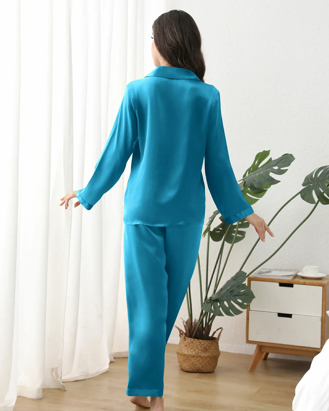 Every detail, from the French seams to the bias-cut hem, reflects artisanal craftsmanship. Hypoallergenic and machine-washable, this versatile set transitions seamlessly from bedtime to casual lounging, making it an ideal gift for anniversaries, birthdays, or a well-deserved self-care treat.#color_peacock-blue
