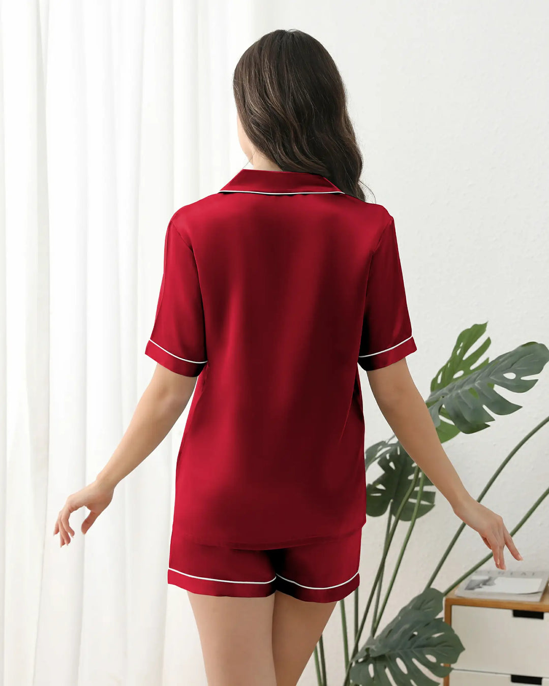 Refined Matching Buttons & Piping Trim: Seamless color-coordinated buttons and delicate piping add sophistication while ensuring durability.#color_garnet