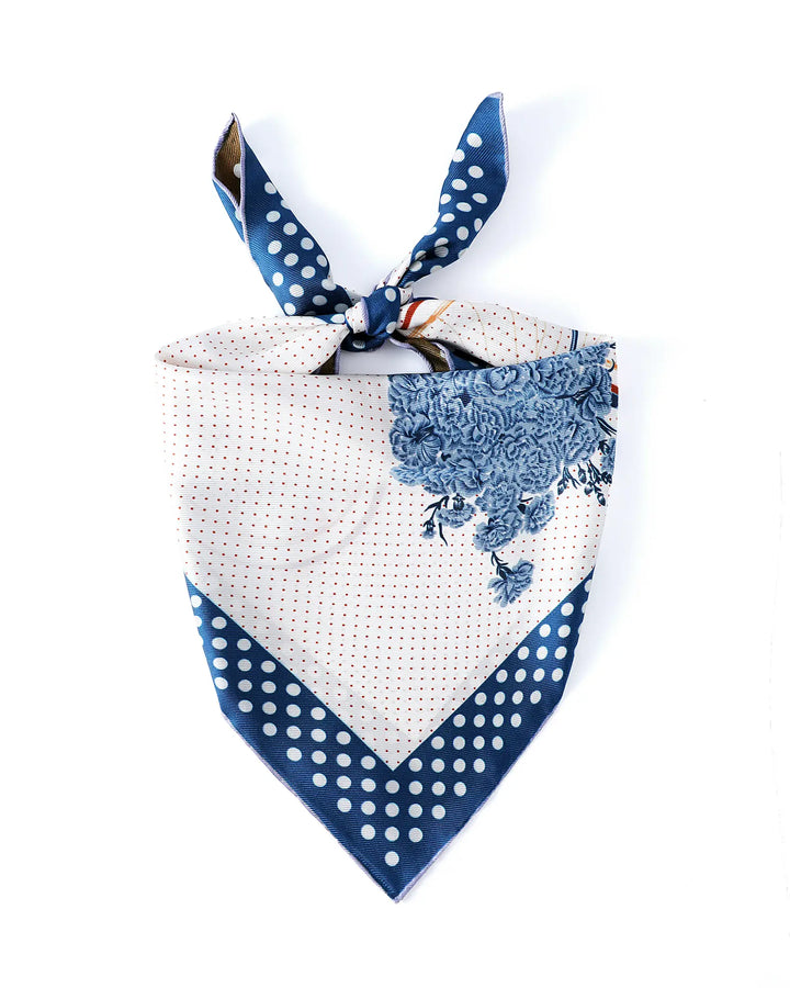 Dog bandana with white and blue patterns on a white background