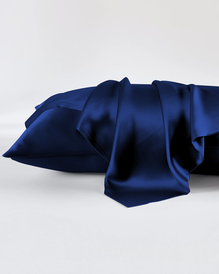 Blue satin fabric on a white background