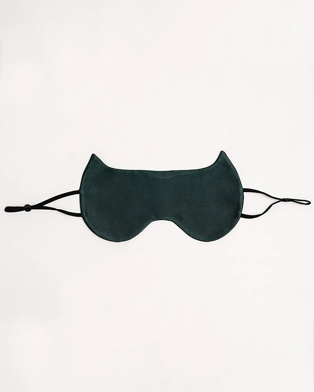A dark green SusanSilk Cat Shape Silk Eye Mask with cat-ear-shaped design, featuring black adjustable straps on either side, is laid flat on a white background.