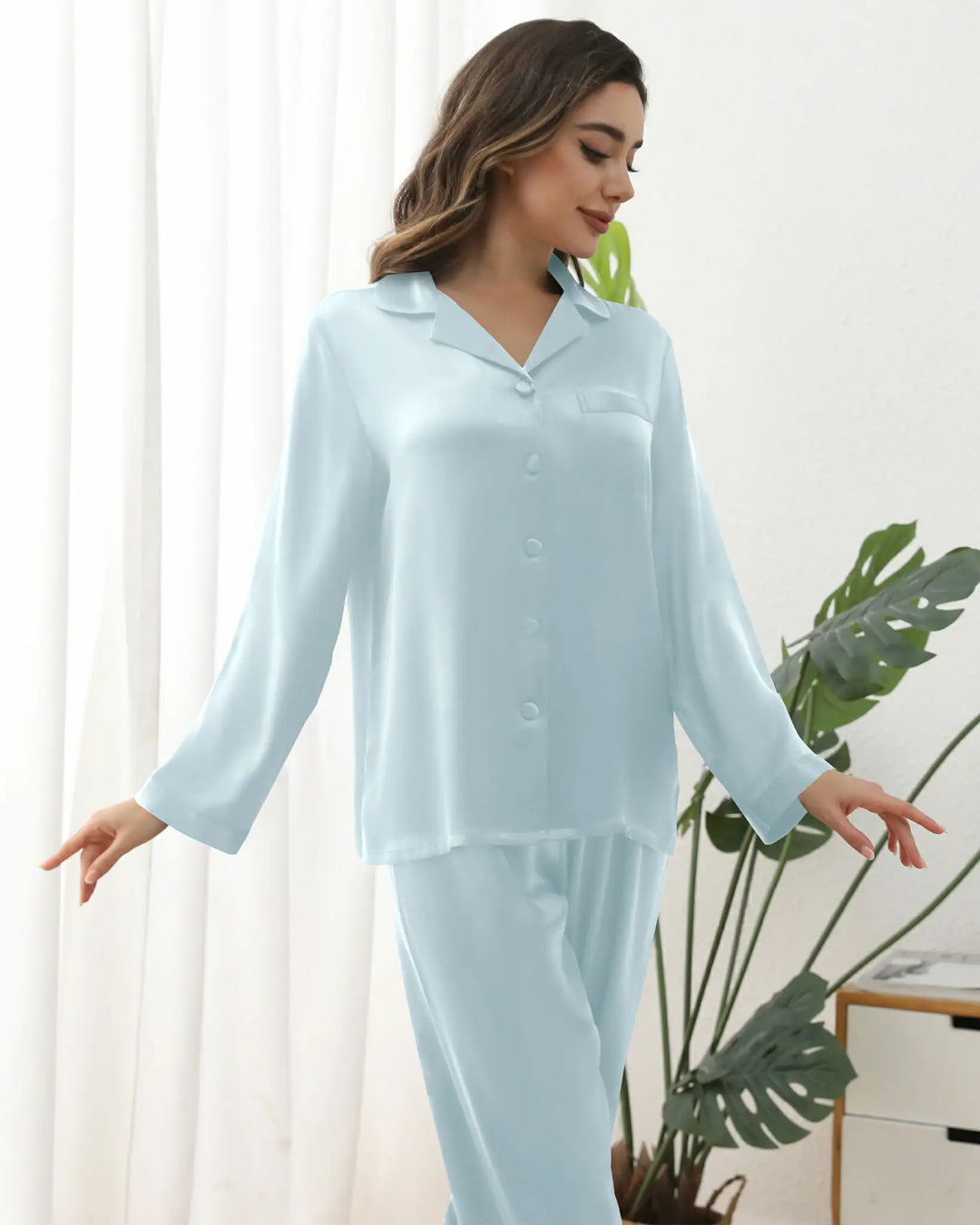 Elevate your relaxation ritual with our 16 Momme 100% Mulberry Silk Pajama Set, a harmonious blend of understated elegance and everyday functionality. Woven from premium 16-momme silk—renowned for its silken drape and breathability.#color_light-blue