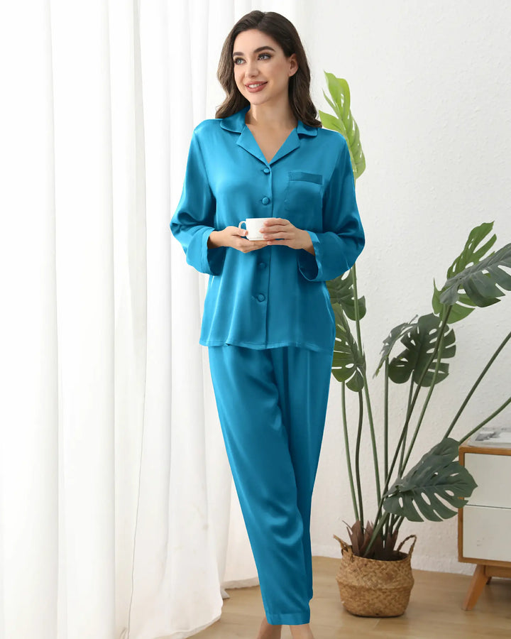 Elevate your relaxation ritual with our 16 Momme 100% Mulberry Silk Pajama Set, a harmonious blend of understated elegance and everyday functionality.#color_peacock-blue