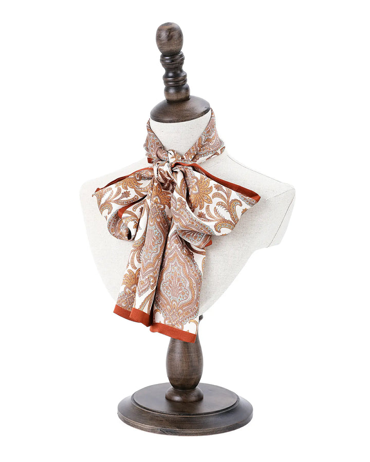 Mannequin with a scarf on a white background