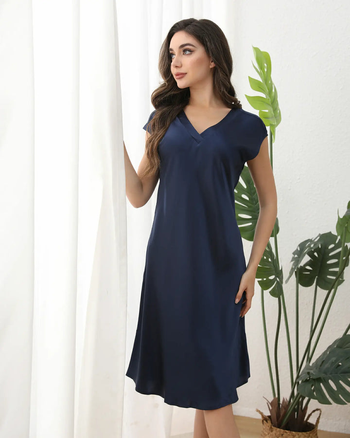 The relaxed, flowing silhouette balances comfort with sophistication for everyday elegance.#color_navy-blue