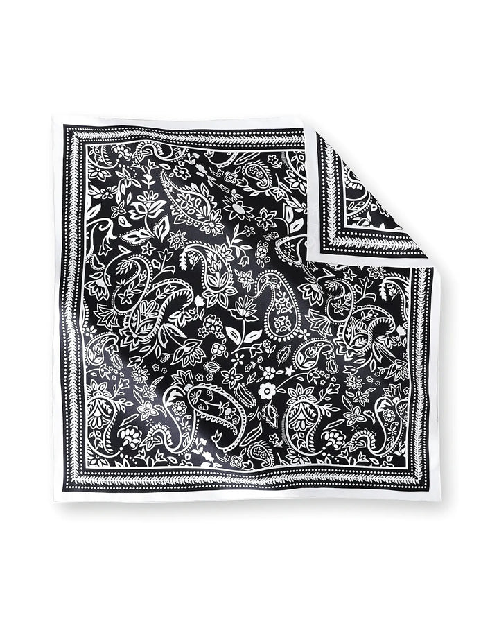 Black and white paisley patterned bandana on a white background