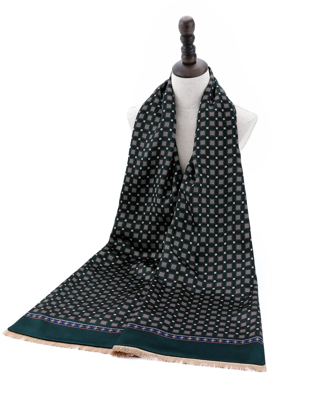 Green luxury silk scarf displayed as an elegant autumn and winter fashion accessory.#color_forest-green
