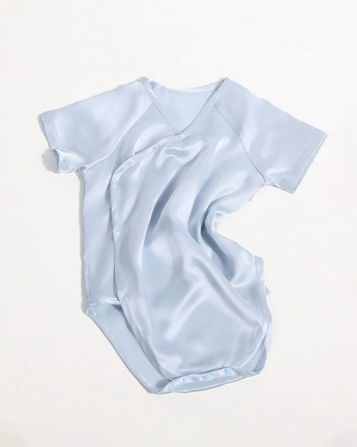 Ice blue mulberry silk baby kimono onesie with side snap buttons and lightweight breathable silk fabric