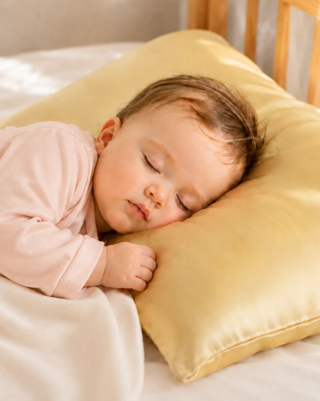 Toddler sleeping on soft mulberry silk pillowcase designed for sensitive skin and comfortable sleep