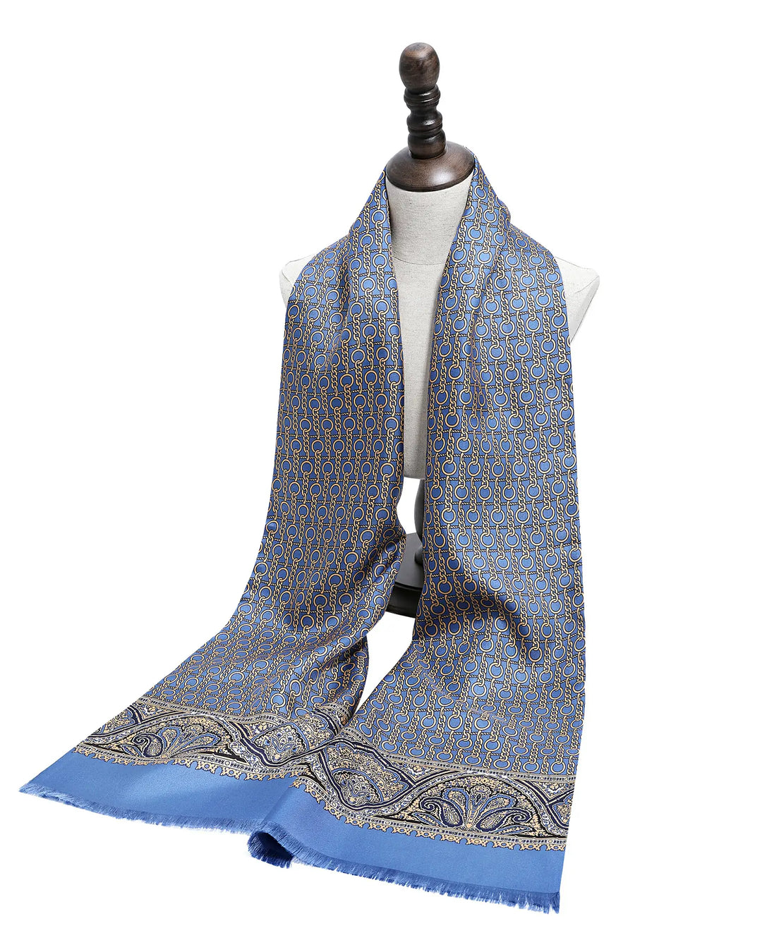 Blue patterned scarf on a mannequin against a white background.#color_azure-blue