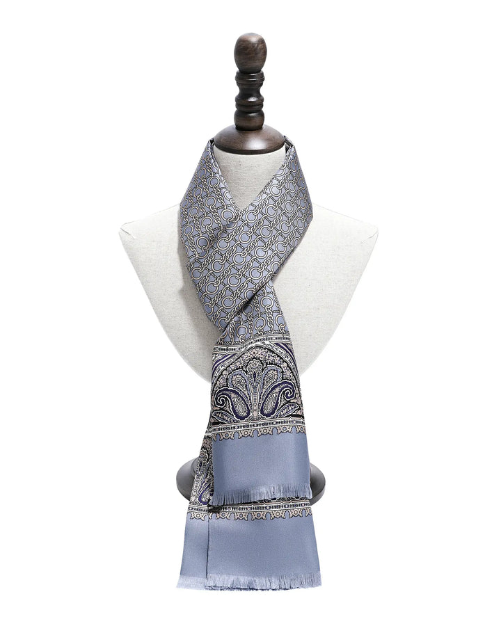 Grey blue paisley silk scarf for men displayed with classic gentleman style.#color_dove-gray
