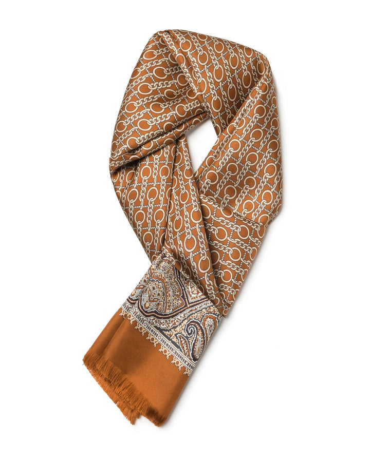 Orange men's silk scarf featuring double-sided design and classic tassel finish.#color_cinnamon