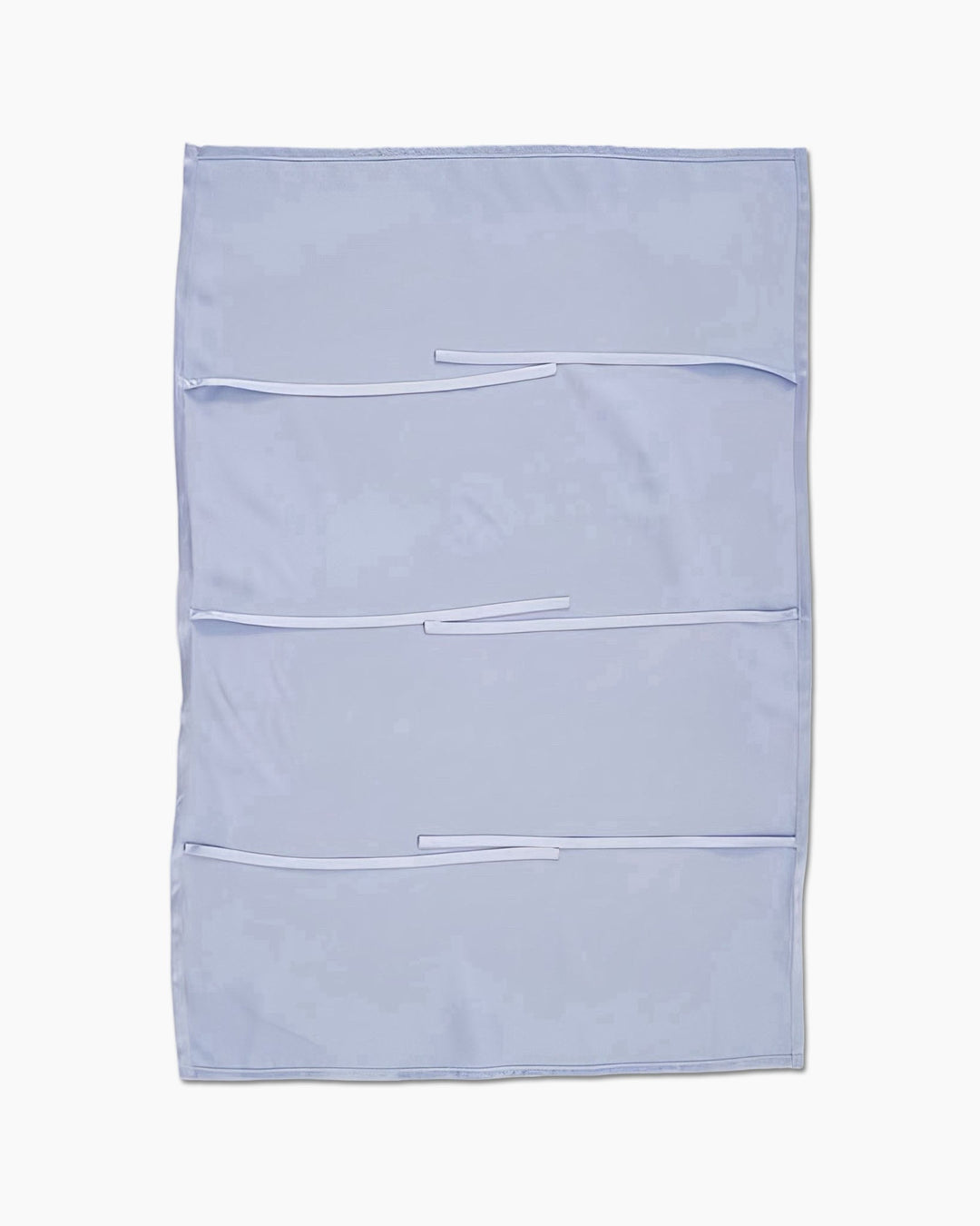 A light blue SusanSilk fabric wall organizer featuring three horizontal pockets and two loops on each pocket for attaching items.
