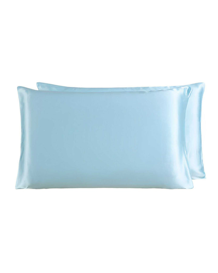 Two light blue 19 Momme Silk Pillowcase Zippers by SusanSilk are shown against a white background.