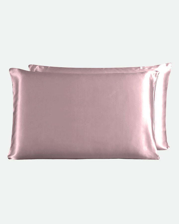 Two SusanSilk 22 Momme Beauty Silk Pillowcase Zippers in pink, stacked together on a light background.