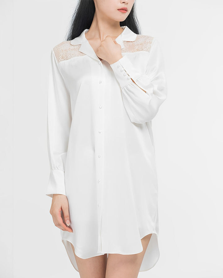 Person wearing a white, long-sleeved Premium Lace Silk Shirtdress from SusanSilk with lace detailing on the shoulders.