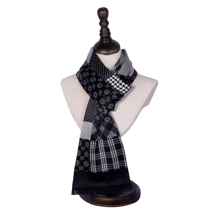A Mix Pattern Long Silk Brushed Scarf by SusanSilk, draped around a beige mannequin bust on a wooden stand.