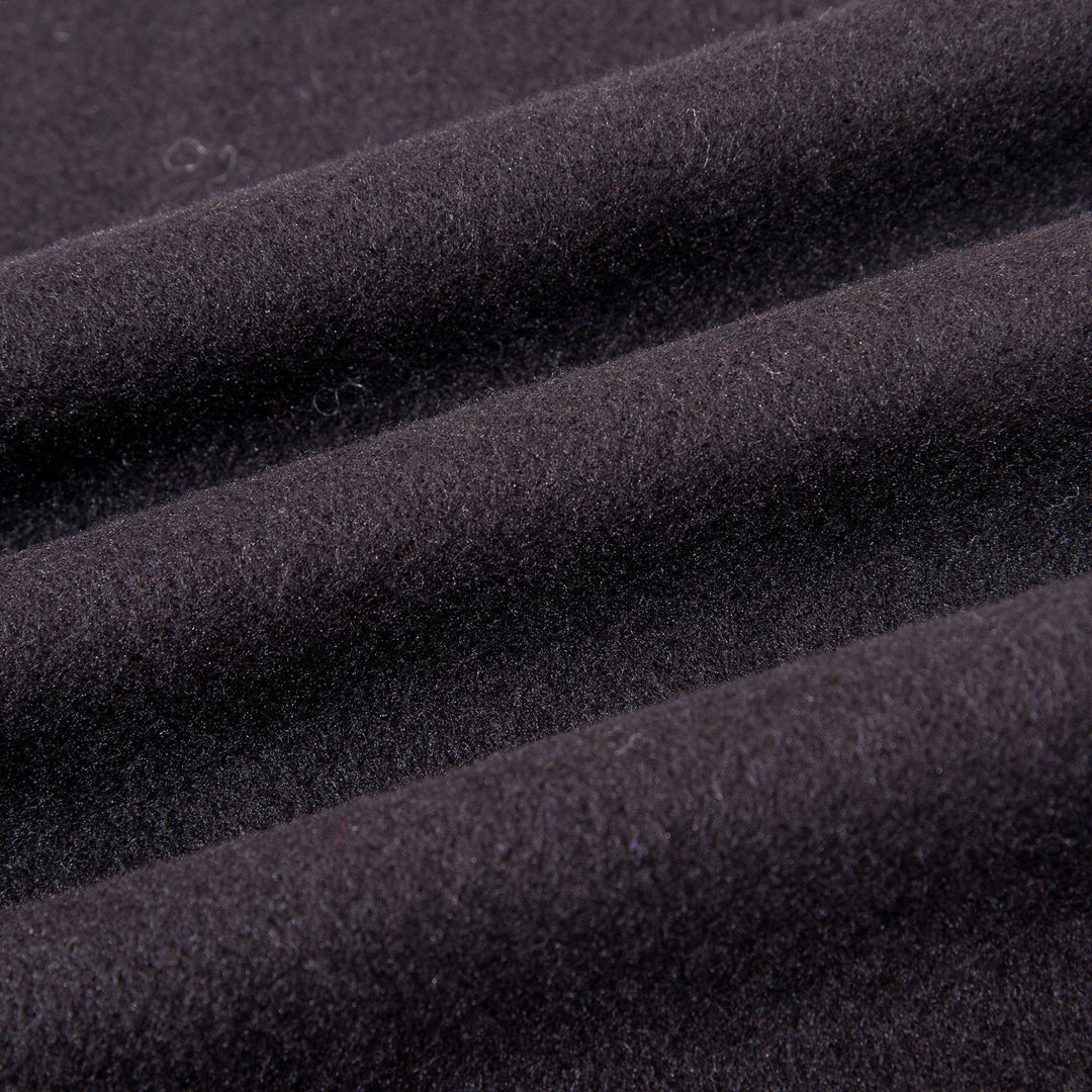 Close-up of the SusanSilk Mix Pattern Long Silk Brushed Scarf showcasing its soft, fuzzy texture and visible folds.