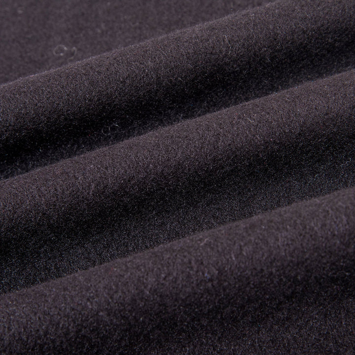 Close-up of the SusanSilk Mix Pattern Long Silk Brushed Scarf showcasing its soft, fuzzy texture and visible folds.