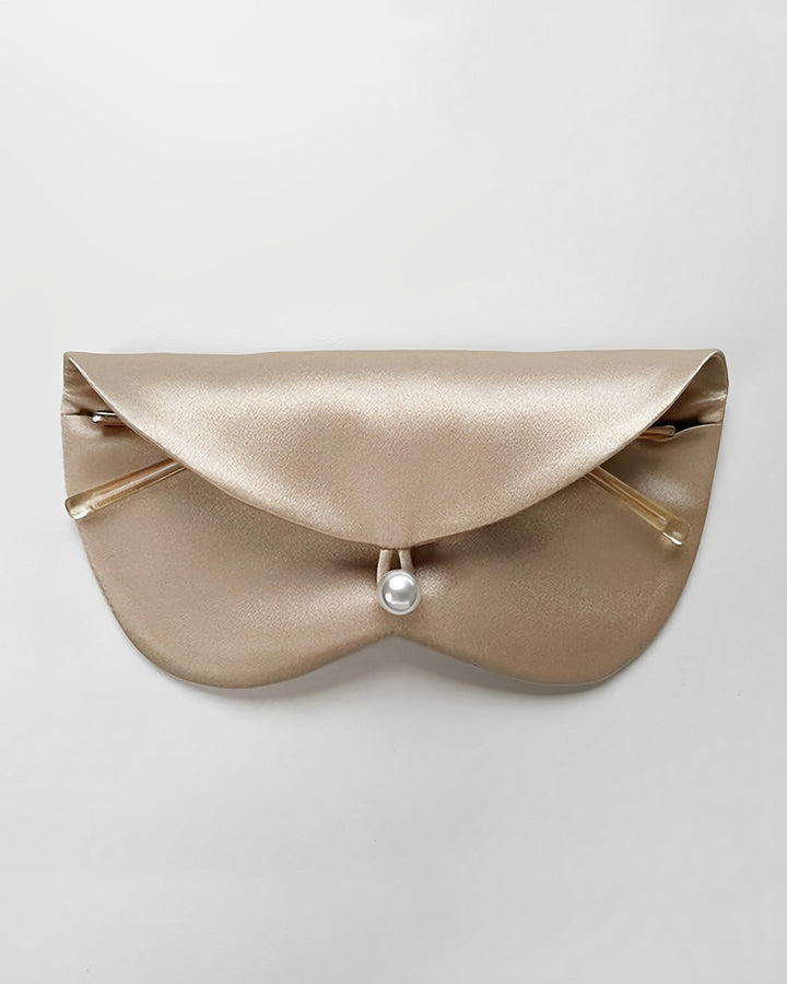 A luxurious envelope-shaped clutch bag from SusanSilk, crafted in gold shade with a pearl-like button clasp and elegant curved edges.