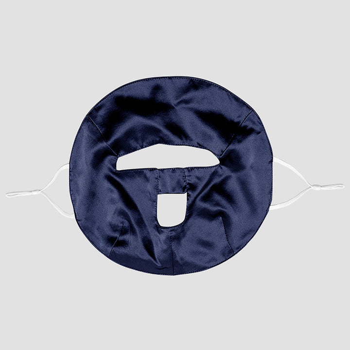 Introducing the Beauty Silk Face Mask by SusanSilk – a dark blue, circular-shaped satin mask featuring two openings, secured by white adjustable straps and crafted from luxurious susansilk for ultimate comfort.