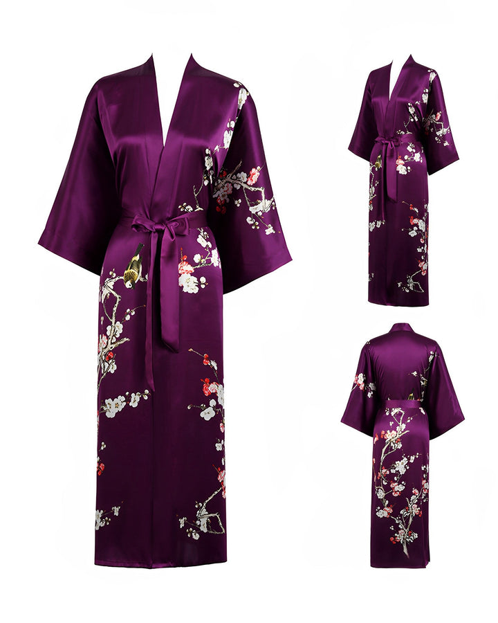 A Plum Blossom Long Silk Kimono from SusanSilk in a deep purple hue with a floral pattern, displayed from the front, side, and back views.