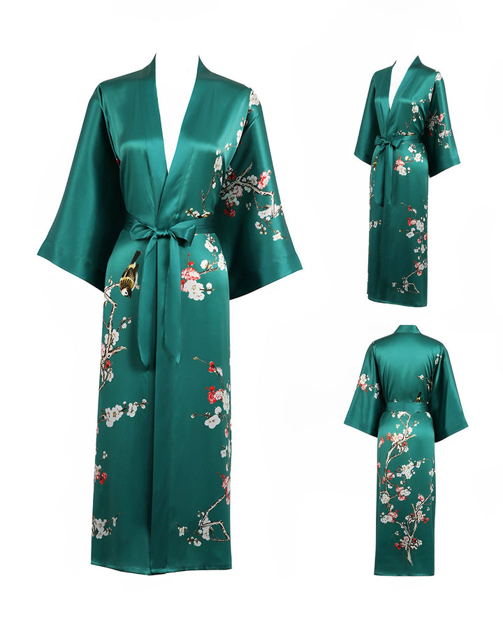 Plum Blossom Long Silk Kimono with floral patterns, medium-length sleeves, a waist tie, and a design featuring cherry blossom branches. Front, side, and back views are shown. SusanSilk craftsmanship ensures elegance and quality.