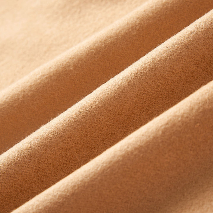 Close-up of SusanSilk gold brushed silk scarf for men, showcasing the soft cashmere texture. 
